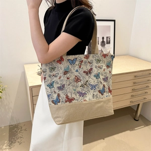 Vintage tote bag with colorful butterfly print and beige canvas stitching for women