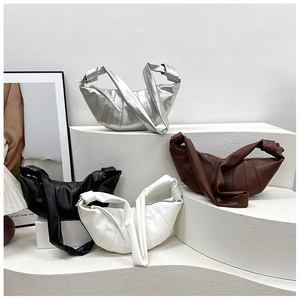 Minimalist oversized dumpling bags in silver, brown, black, and white colors