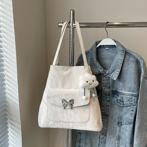 White pleated tote bag featuring silver butterfly buckle and cute cloud charm detail