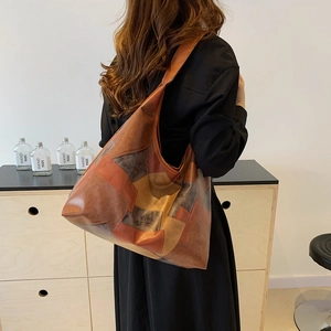 Minimalist large capacity patchwork tote bag with neutral earth-tone geometric patterns