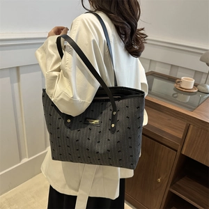 Chic large capacity tote bag with bow tie patterns and vertical stripes for women