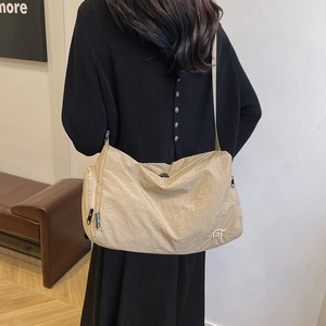 Minimalist beige nylon tote bag with large capacity and stylish fashion embroidery