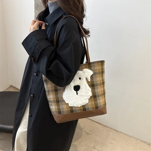Brown plaid tote bag with sheepskin dog patch and faux leather straps for casual wear