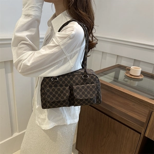Vintage monogram shoulder bag with dual front pockets and top handle for women