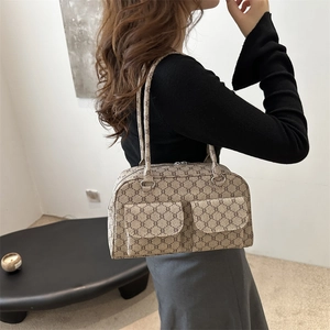 Retro canvas baguette bag with classic patterns, dual front pockets and top handle strap