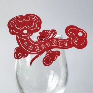 Red Ruyi pattern laser-cut paper wine glass card for festive party table decorations