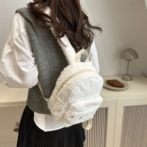 Mini sac à dos blanc en peluche avec oreilles de lapin et broderie rose élégante