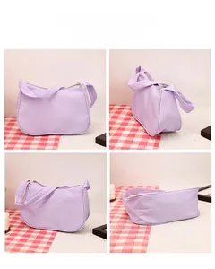 Detailed views showing the light purple crescent shoulder bag from multiple angles