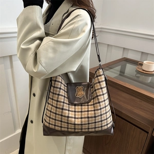 Retro plaid backpack for women with bear embroidery and brown leather shoulder straps