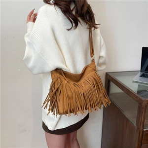 Bohemian brown suede fringe shoulder bag with long tassels and stylish commuter tote design