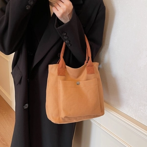 Japanese style khaki canvas tote bag with front snap pocket for casual daily use