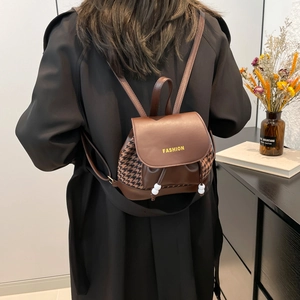 British retro large capacity backpack with brown leather and houndstooth stitching detail