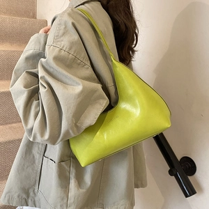 Minimalist bright green leather crescent hobo bag for women with shoulder strap