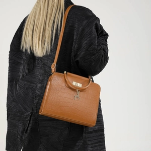 Caramel faux crocodile texture handbag with gold deer charm and slim shoulder strap