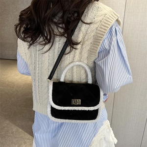 Vintage quilted handbag with frosted black texture and white faux fur trim for women