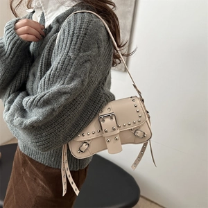 Y2K punk style beige shoulder bag with silver rivets and metal buckle design