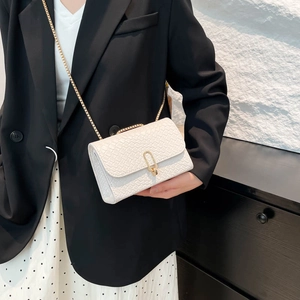 White woven textured flap crossbody bag with elegant gold chain and rectangular lock