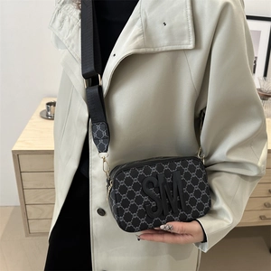 Classic black monogram crossbody bag with SM logo and wide nylon shoulder strap for women