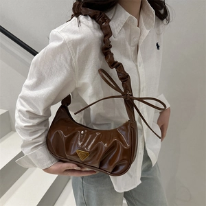Retro dark brown patent leather cloud bag with pleated design and ruffled shoulder strap