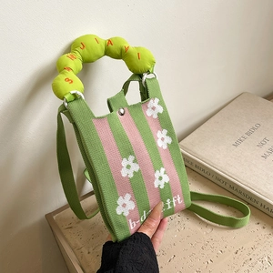 Mini floral knitted crossbody bag with green stripes and soft padded handle for women