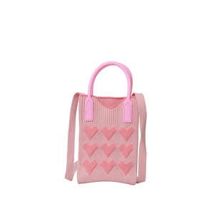 Pink knitted mini phone bag with 3D heart patterns and crossbody shoulder strap