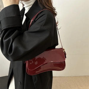 Chic burgundy patent leather baguette shoulder bag with shiny finish for women