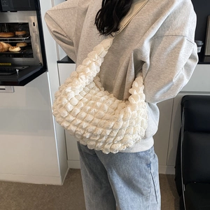 Off-white puff cloud crossbody bag with pleated texture and stylish crescent moon shape