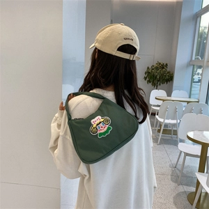 Green vintage baguette shoulder bag with bear embroidery and adjustable strap