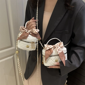 Chic quilted mini handbag with camellia logo and leopard print scarf handle wrap