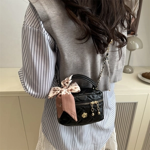 Mini quilted leather crossbody bag with leopard scarf handle and gold flower detail