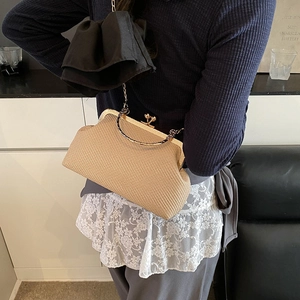 Chic beige woven chain shoulder bag with vintage gold metal frame and bead clasp