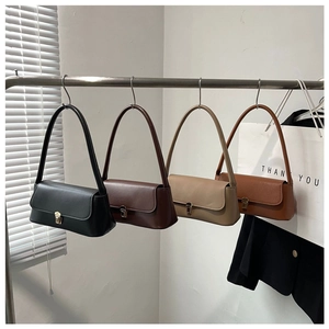 Selection of baguette shoulder bags in black, coffee, khaki, and brown with gold hardware