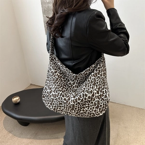 Fashionable leopard print canvas tote bag with a spacious half-moon shape for women