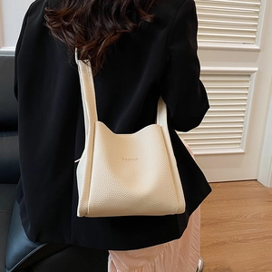 Minimalist cream white leather bucket bag with top handles and Fashion lettering