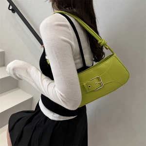Avocado green baguette shoulder bag with gold square buckle and chic knotted strap detail