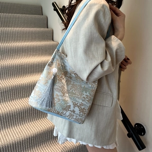 Blue Chinoiserie embroidery tote bag with landscape pattern and tassel charm