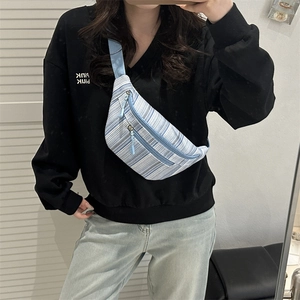 Minimalist light blue striped canvas waist bag with dual zippers for daily casual wear