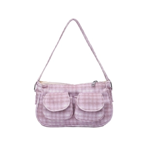 Pink corduroy crossbody bag with double front pockets and adjustable shoulder strap