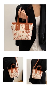 Detailed views of graffiti tote bag showing handheld, shoulder and crossbody carrying styles