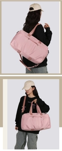 Bolso de viaje rosa de gran capacidad con correa ajustable y nailon impermeable