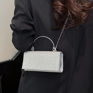 Sparkly silver rhinestone evening clutch bag with metal handle and chain shoulder strap