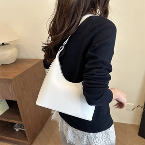 Minimalist white half-moon underarm bag with adjustable silver buckle strap for women