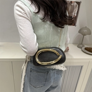Crossbody box bag in black leather with gold metal handle and chain strap for women
