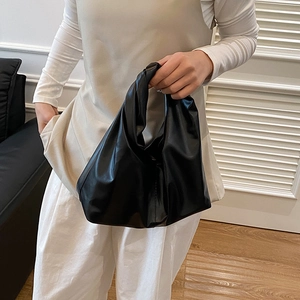 Minimalist black soft leather handbag with pleated knot handle design for women