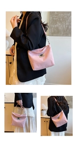 Detail showing pink corduroy texture and Myron Bear patch on the shoulder bag