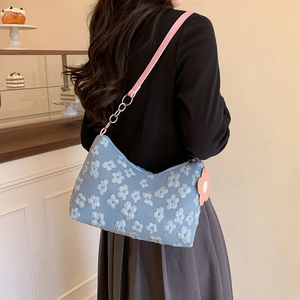 Floral print underarm bag with blue jacquard fabric and pink leather strap for women