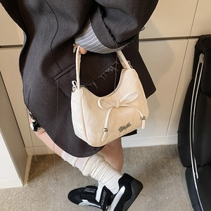 Fashionable cream bow hobo bag with silver logo detail for women in 2025 summer