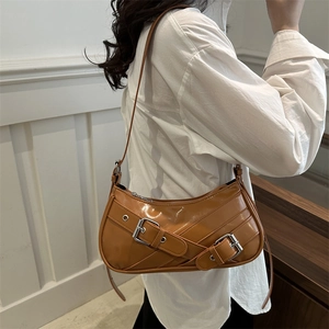 Brown patent leather baguette underarm bag with silver buckles and Y2K stitching