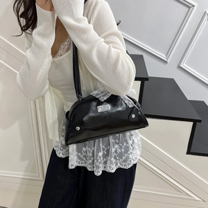 Minimalist black shell bag with white lace trim and silver metal plaque for women