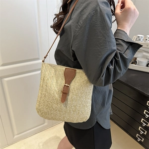 French straw woven crossbody bag with brown leather strap for summer beach vacation